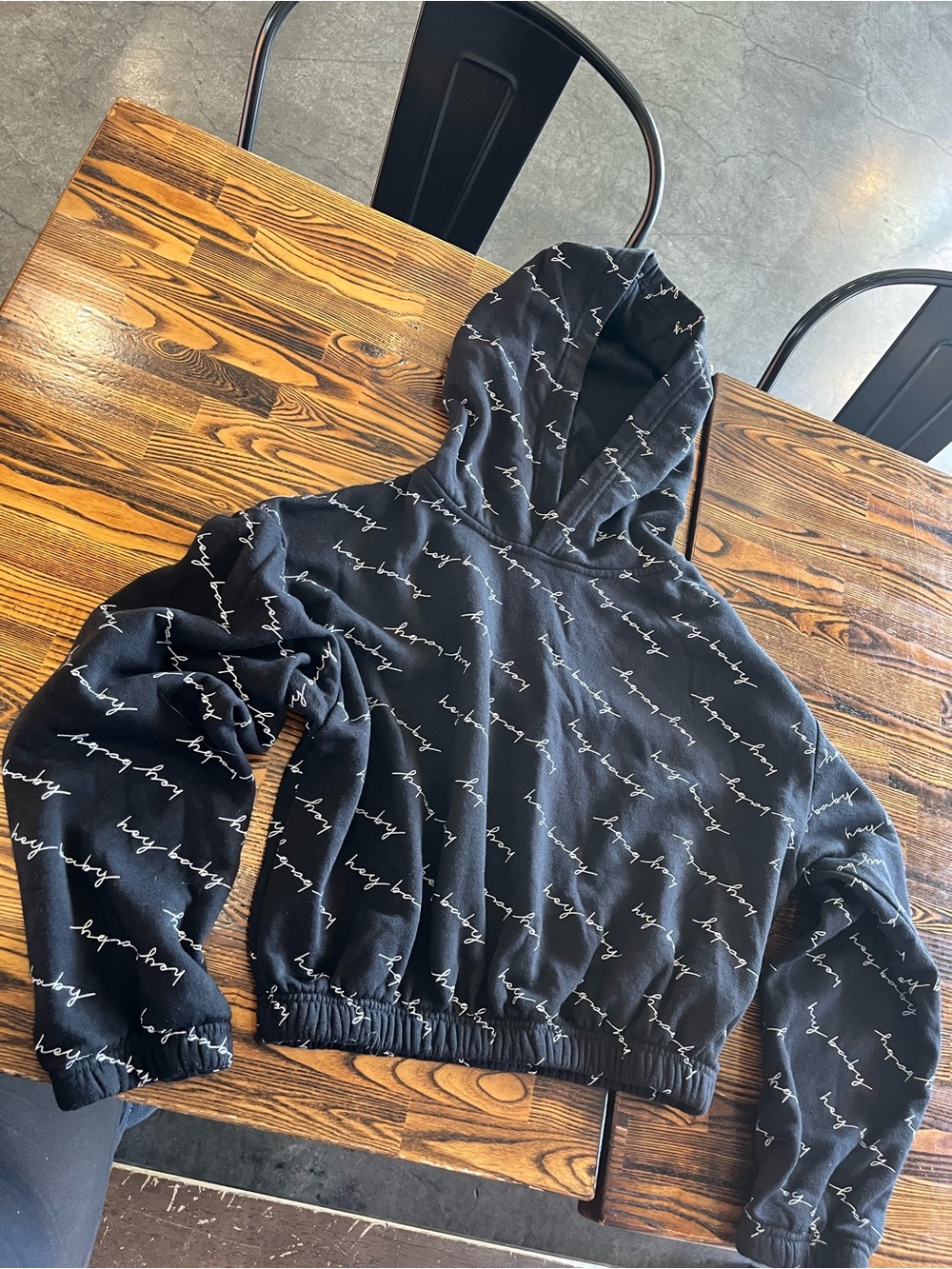 refuge Black Hoodie Sweater with “Hey Baby” Print